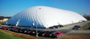 This air-supported dome in Williamsport, Pa., is 246 feet by 550 feet by 78 feet high and is designed to withstand 90 mph wind loads and up to 35 pounds-per-square-foot snow loads using PVC-Tedlar-coated polyester fabric. Photo: Big Span Structures