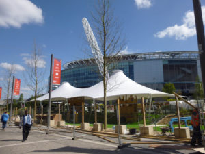 Always light, bright and white, a double-conic canopy designed by Architen Landrell provides a focal point for the play area at London’s Wembley Park. Photos: Architen Landrell Associates