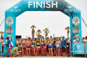 Inflatables are popular for race start and finish lines, such as the one shown here in Huntington Beach, Calif., emblazoned with the Roxy name and photos of its fitness clothing. Photo: Bigger Than Life. 
